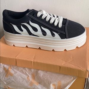 90s style skate sneakers from Dolls Kill.